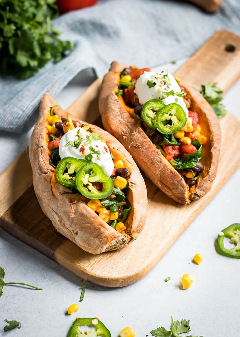 stuffed sweet potatoes on board.