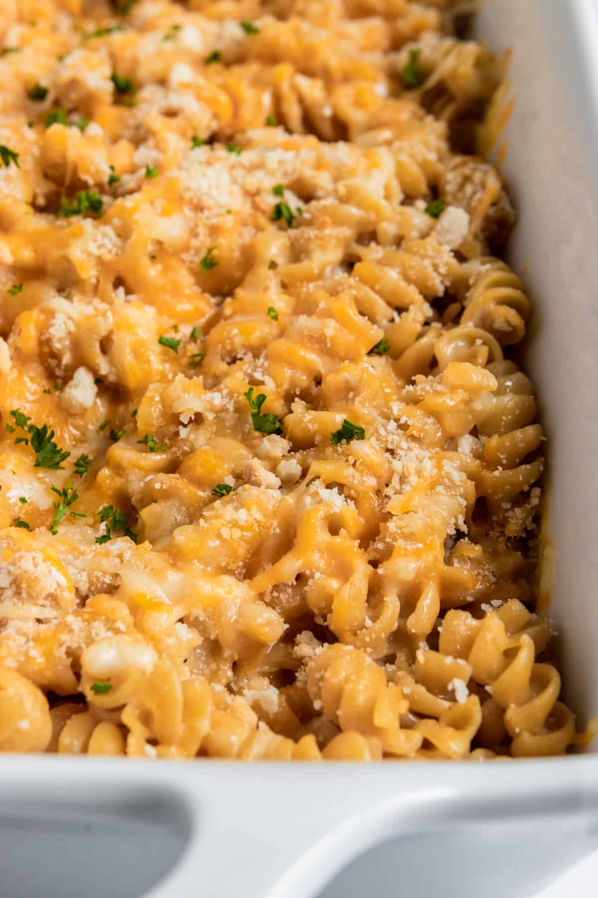 Baked mac and cheese in casserole dish.