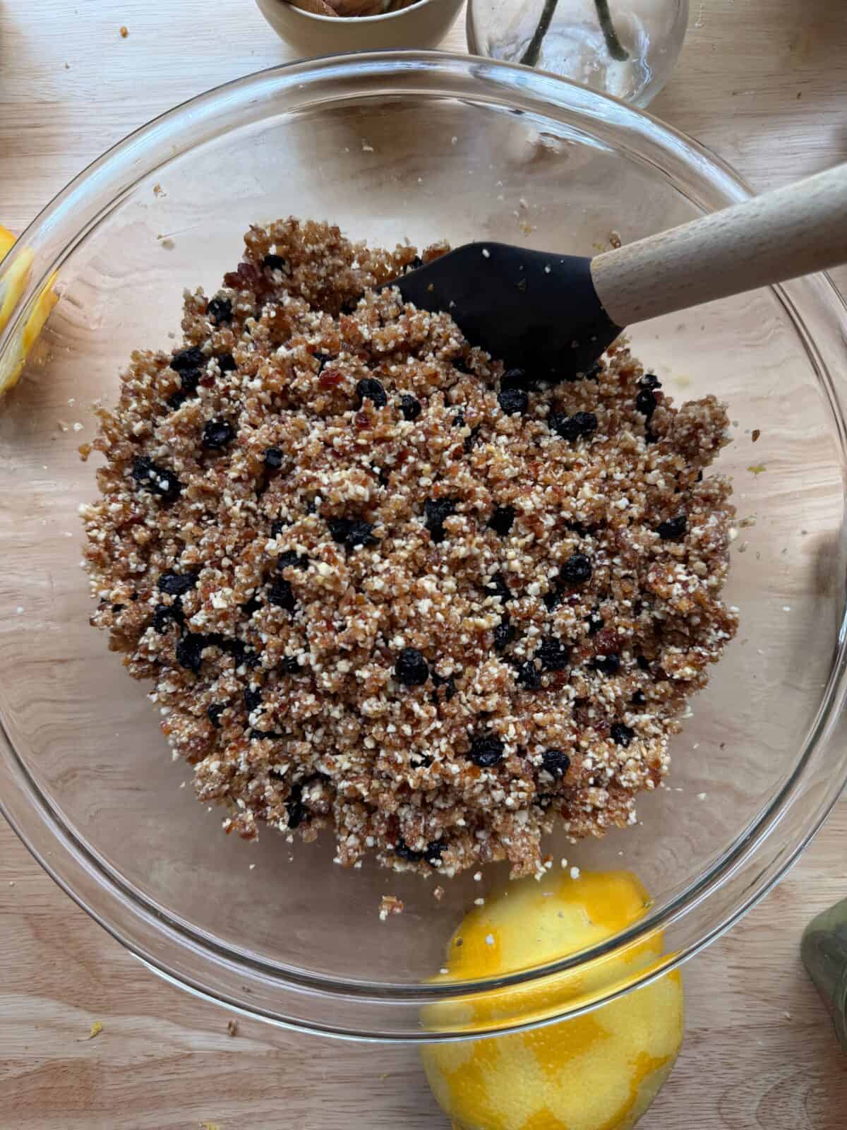 Dried blueberries stirred into date and cashew mixture.
