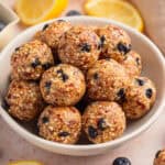Blueberry lemon energy balls in bowl.