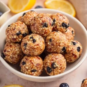 Blueberry lemon energy balls in bowl.