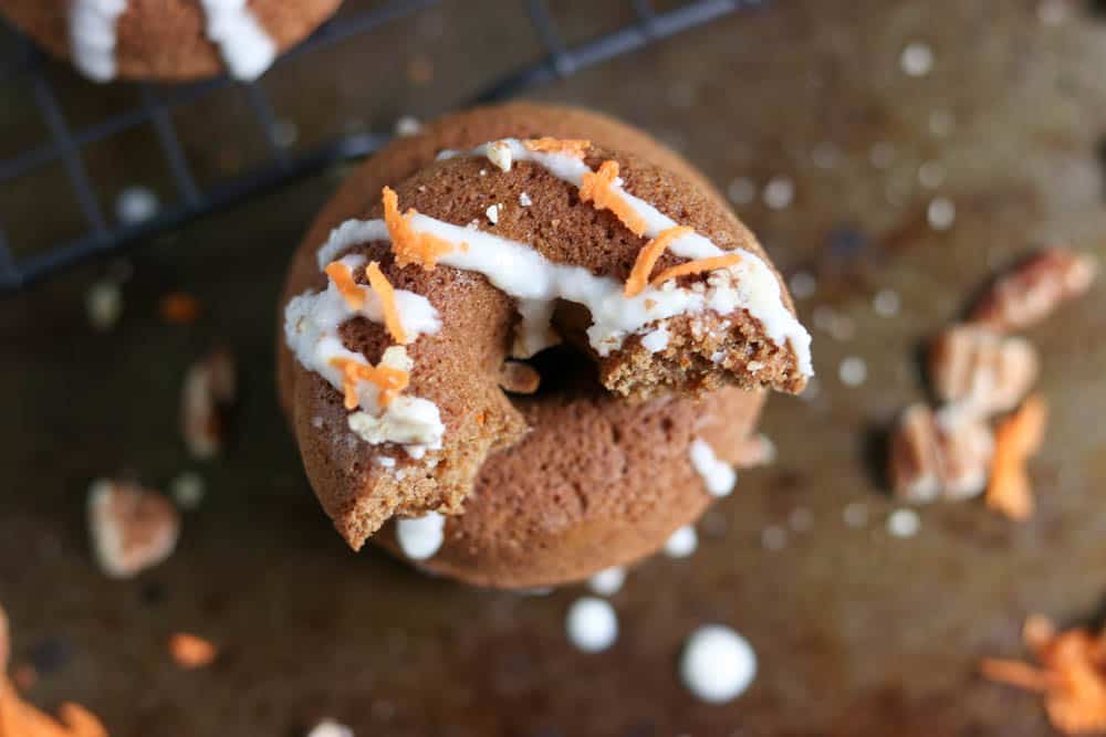 Carrot cake donuts with coconut drizzle.