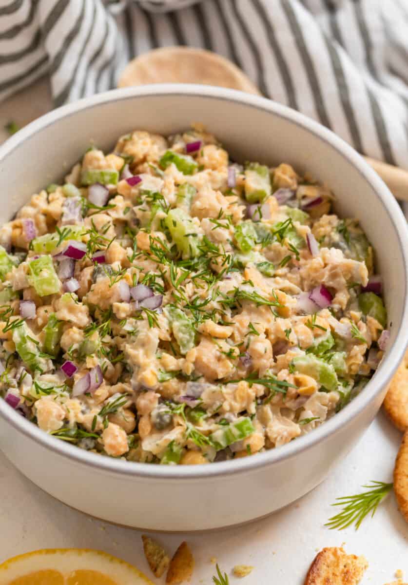 Vegan chickpea mock tuna salad in bowl with fresh dill.