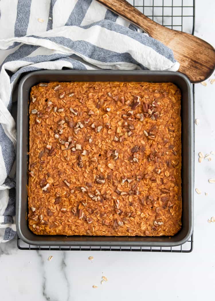 Pumpkin Baked Oatmeal in baking pan with pecans.