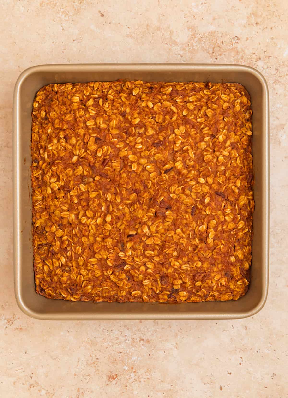 Baked pumpkin oatmeal in pan.