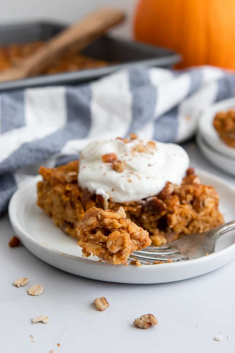 Oatmeal on plate with forkful.