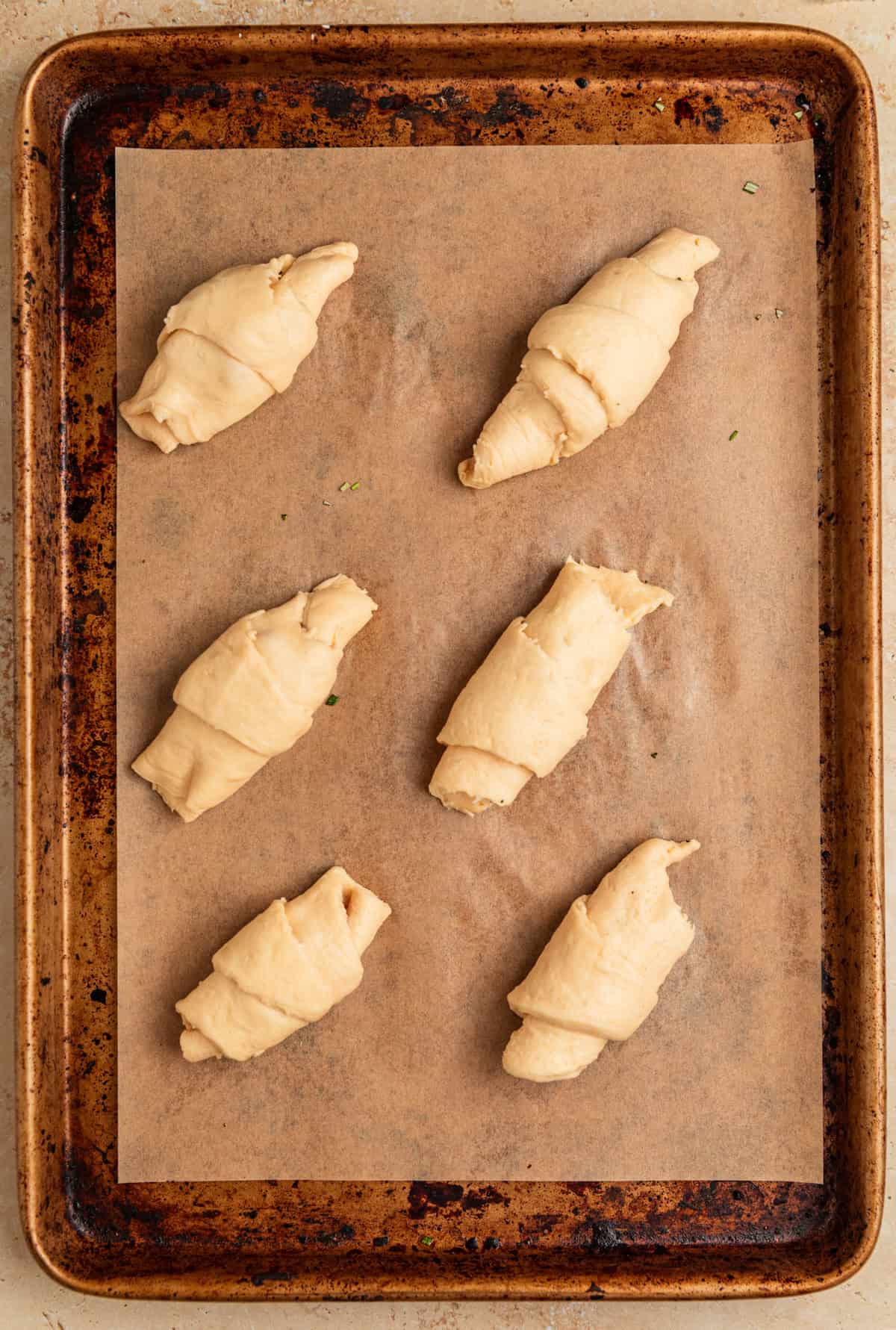 Crescent rolls before baking on sheetpan.