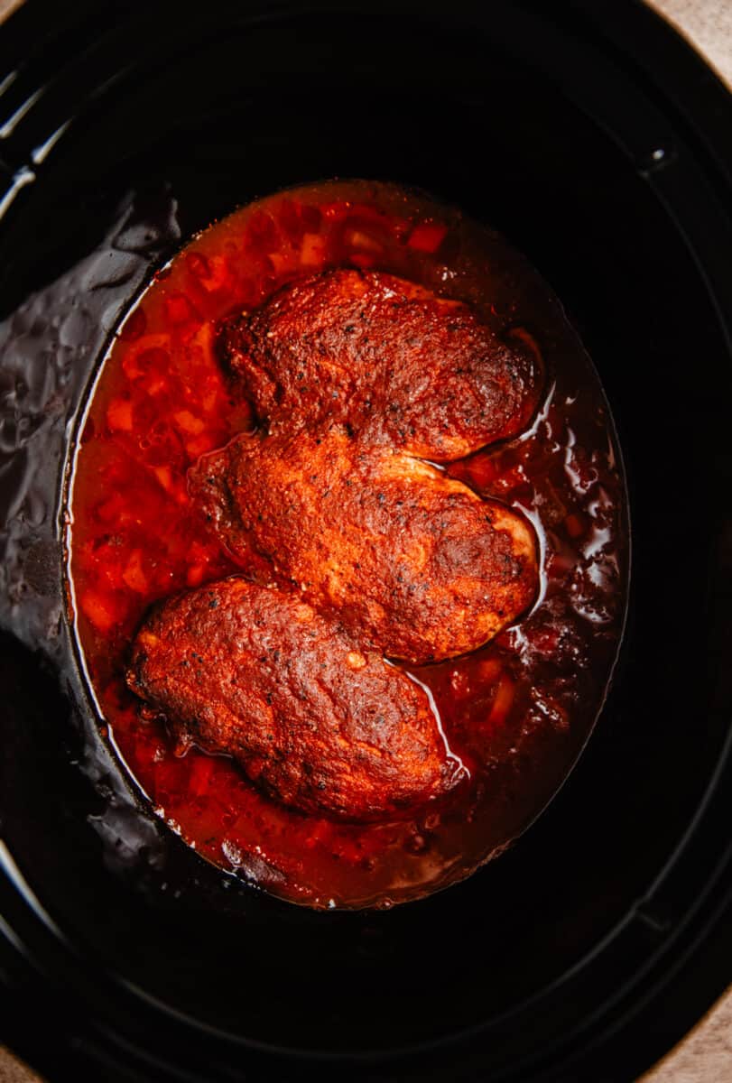 Cooked BBQ chicken in crock pot.