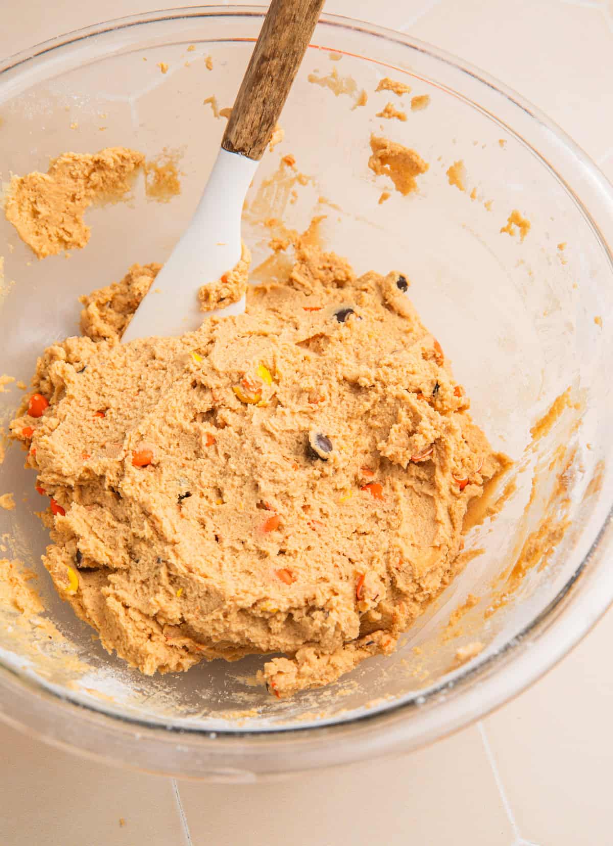Edible cookie dough with Reese's pieces candy mixed in.
