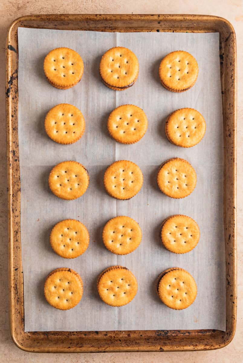 Ritz cracker cookies on cookie sheet.