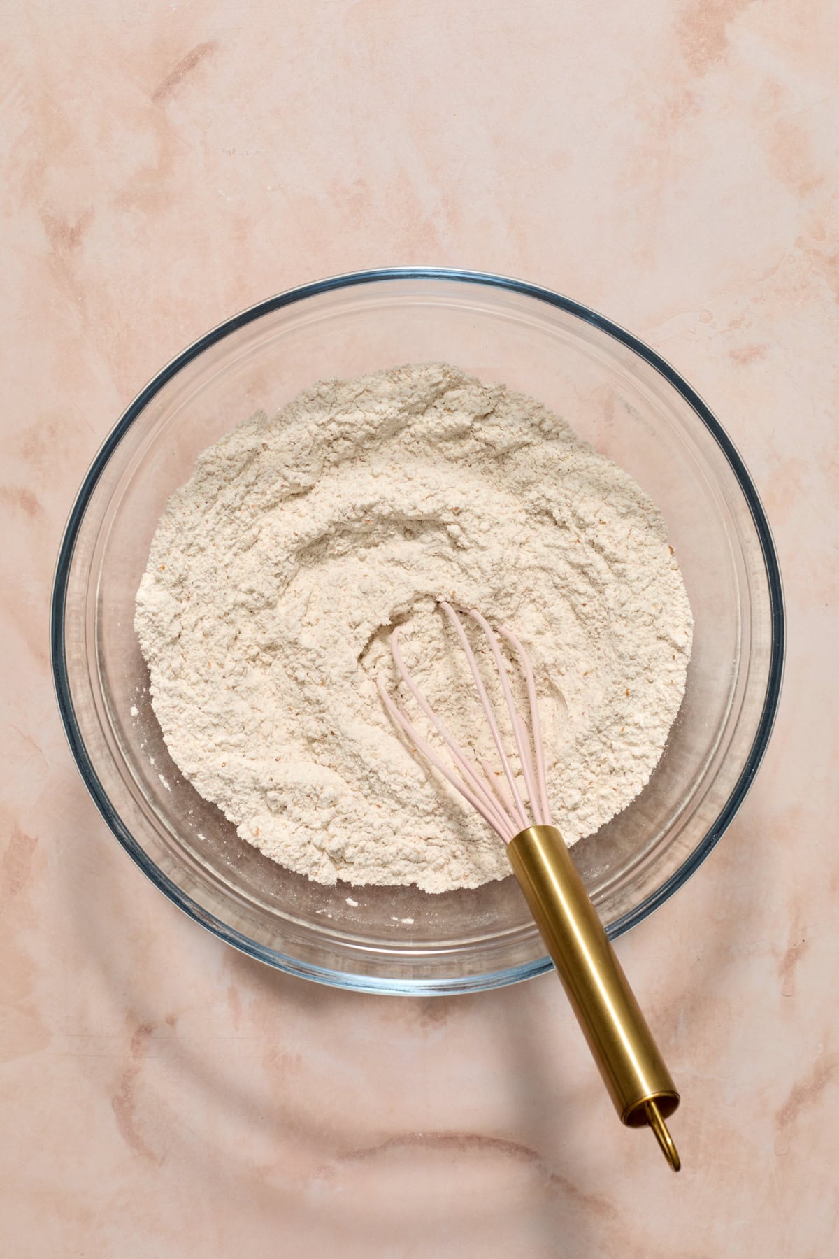 Whisk in glass mixing bowl with dry igredients.
