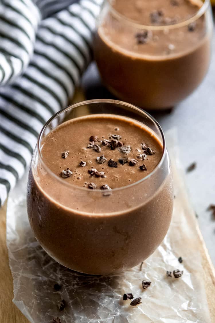 Chocolate Smoothie in glasses with cacao nibs