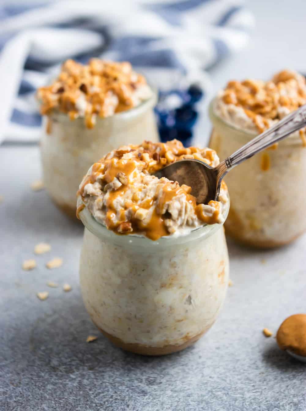 Overnight oatmeal in jar with spoon.