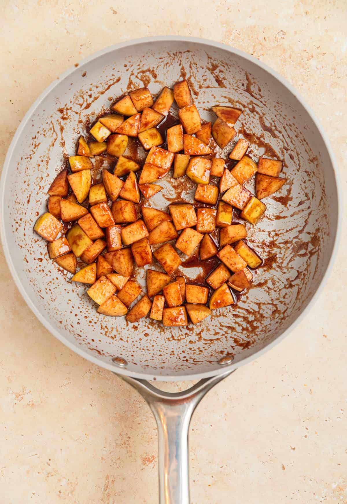 Cinnamon apples in skillet.