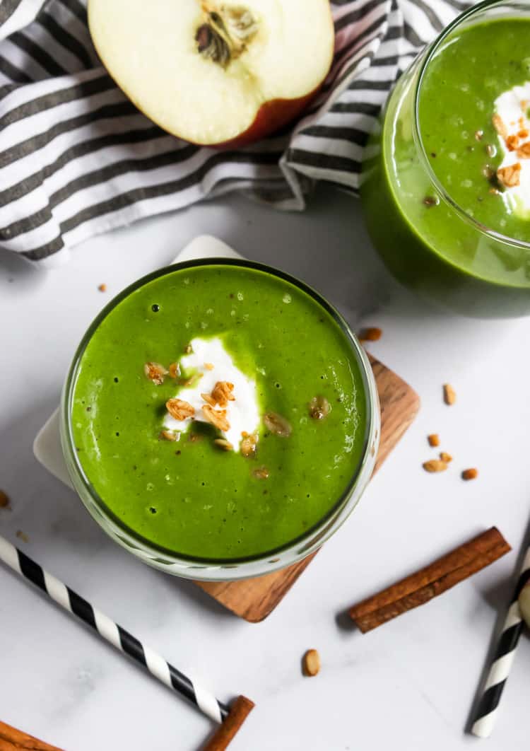 Apple Green Smoothie with dollop of yogurt and granola.