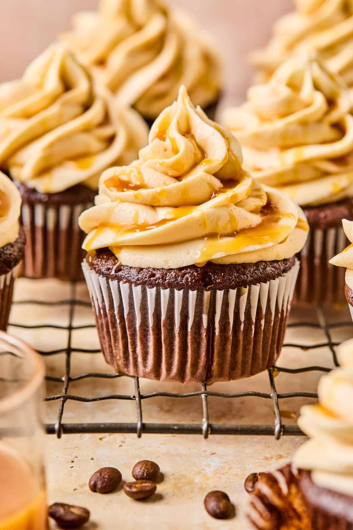 Mocha cupcakes with salted caramel buttercream topped with caramel sauce.