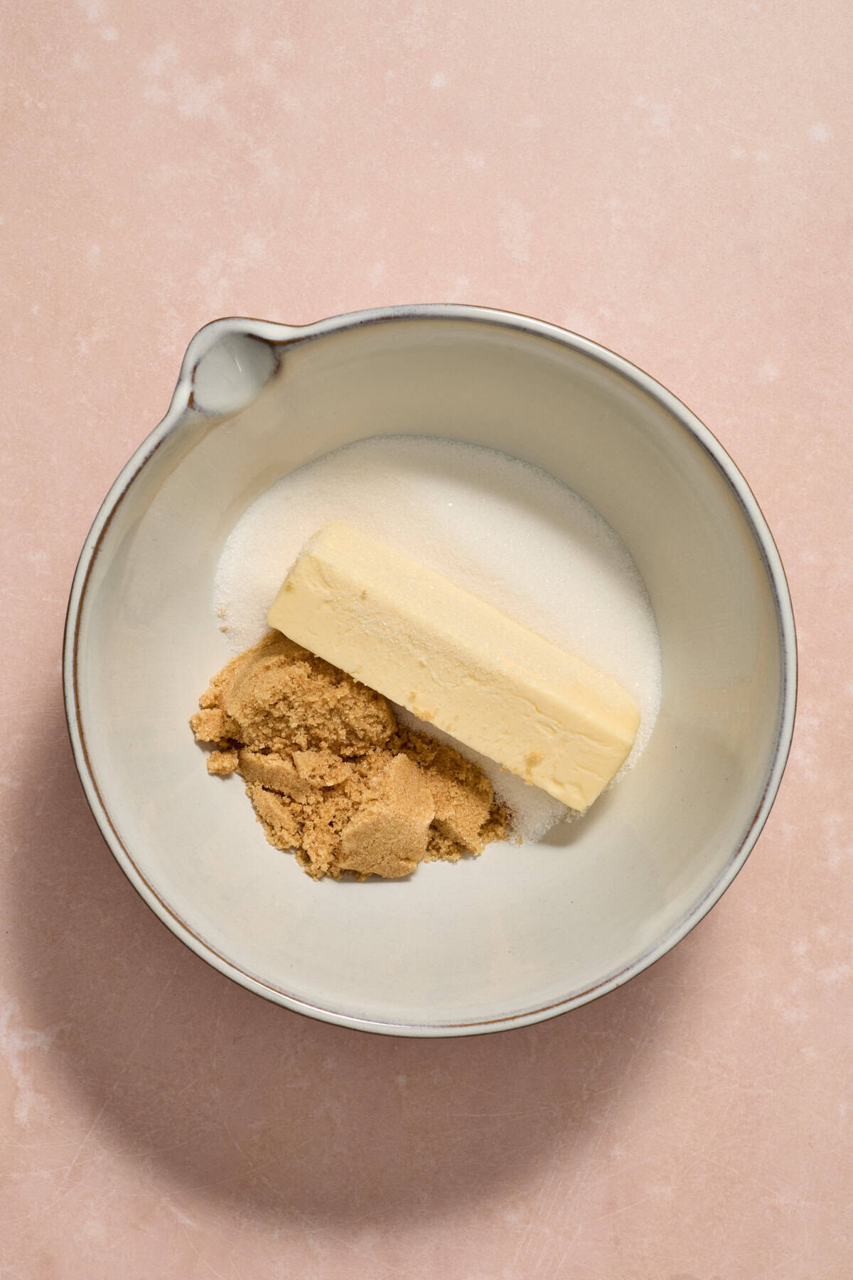 Softened butter, sugar and brown sugar in mixing bowl.