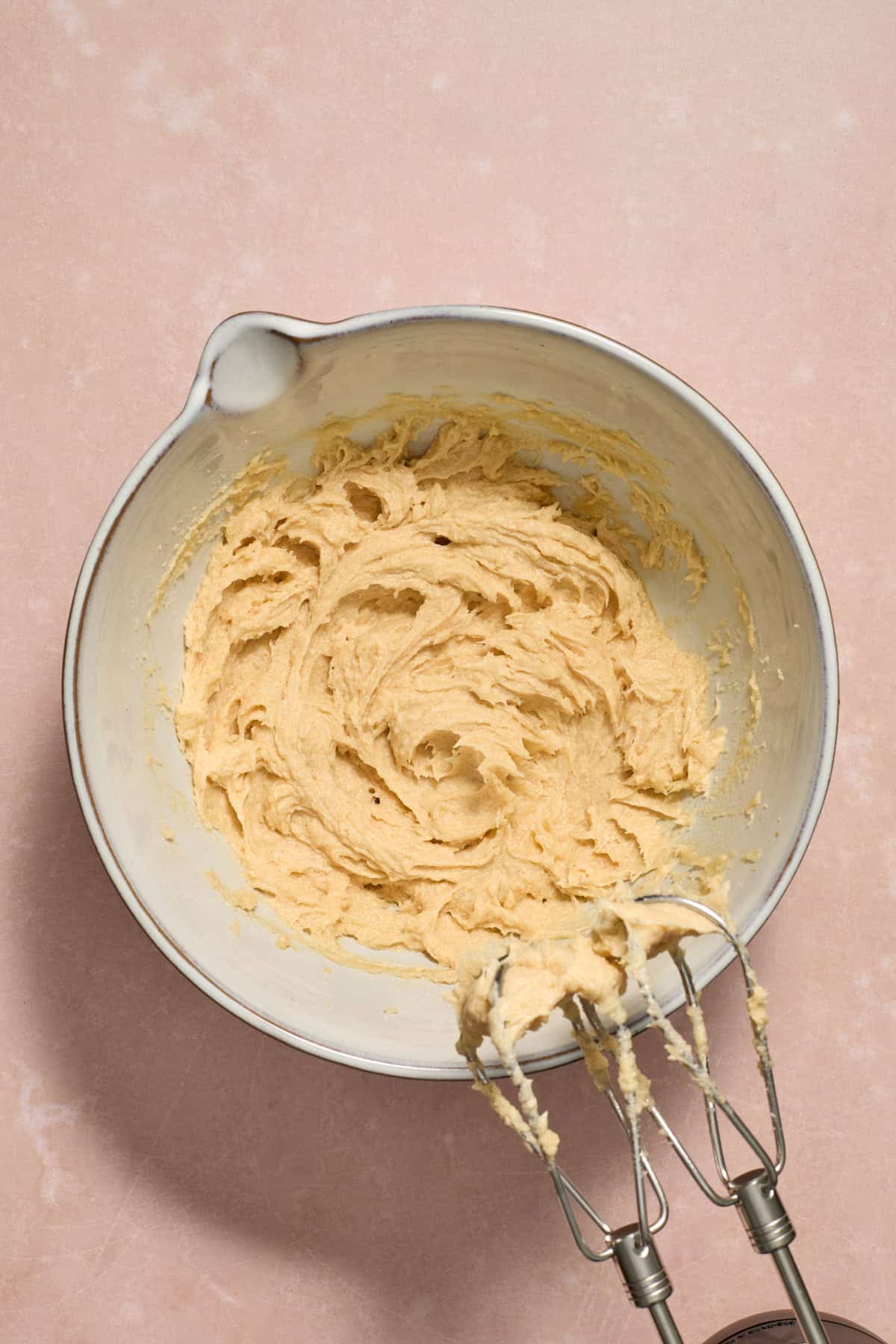 Cookie dough mixture in bowl before dry ingredients added.