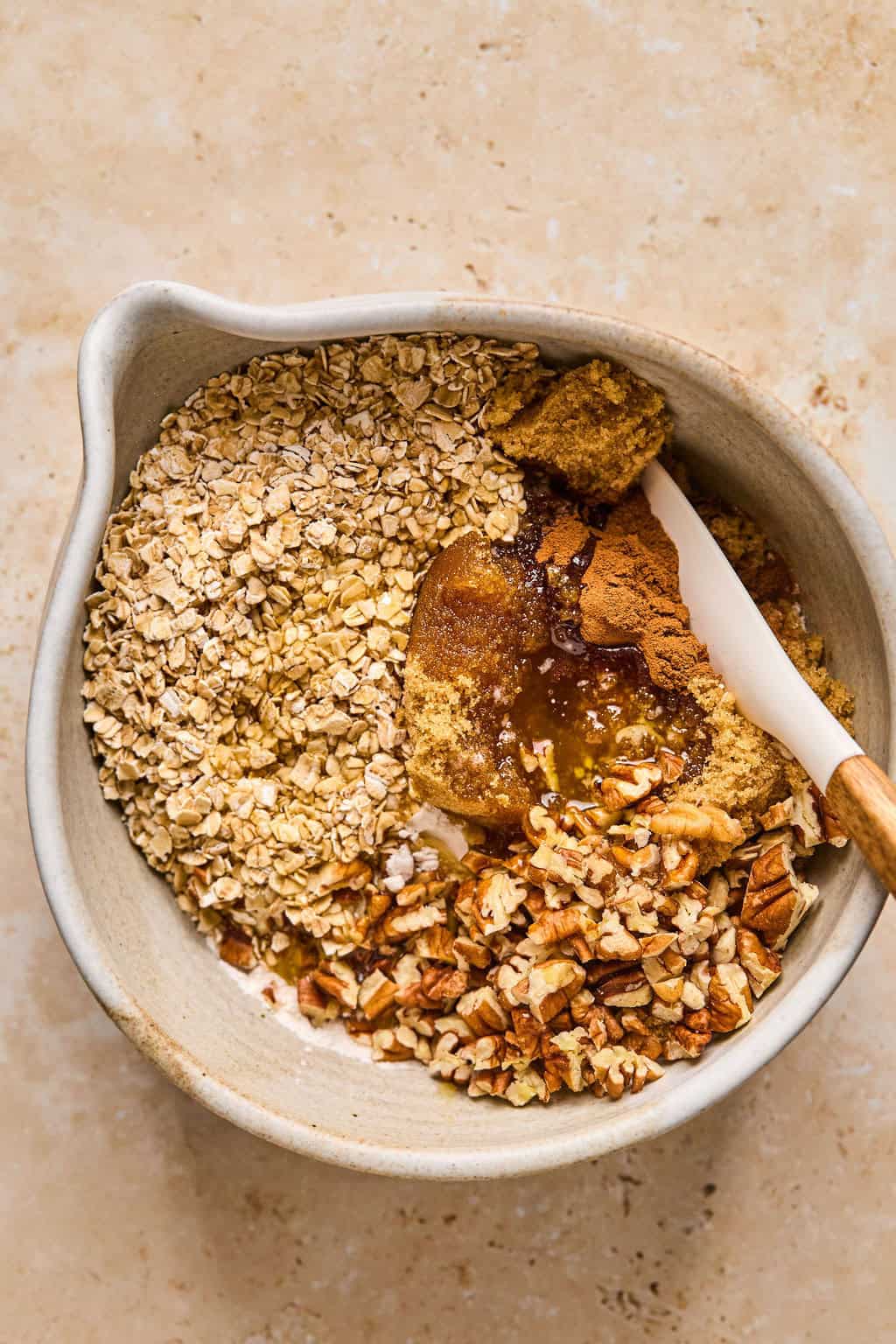 Crumble or crisp topping ingredients in mixing bowl with spoon.