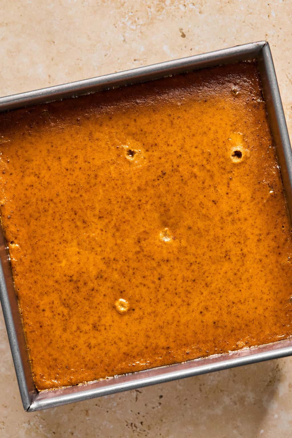 Baked pumpkin layer for pumpkin crumble dessert.