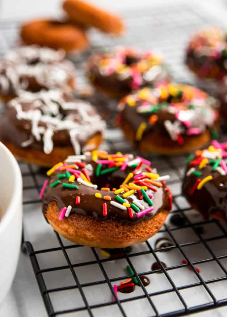 Greek yogurt Whole Wheat donuts on cooling rack.