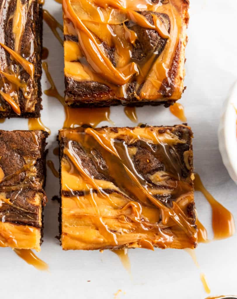 Close up of Cheesecake swirl brownies with dulce de leche drizzle