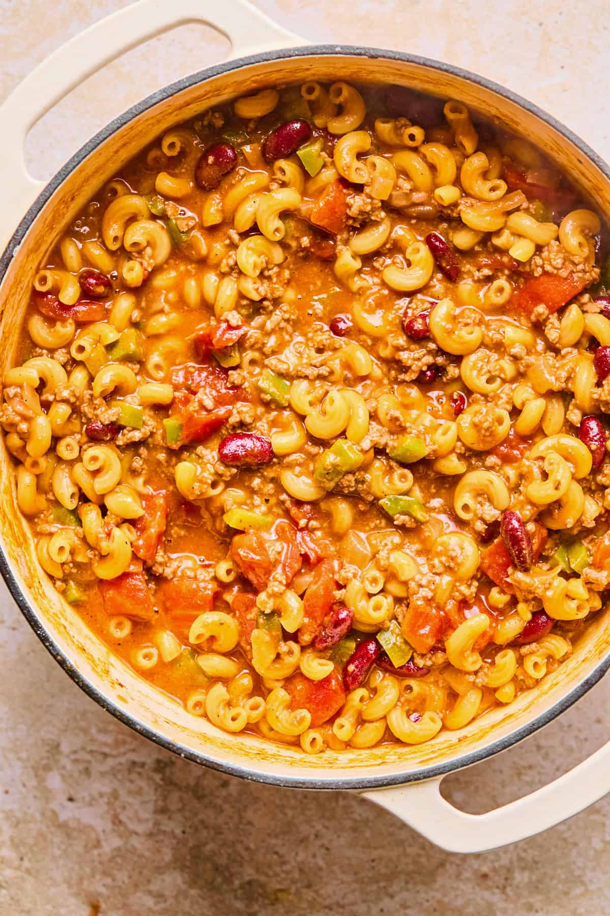Prepped one-pot chili macaroni and cheese in pot.