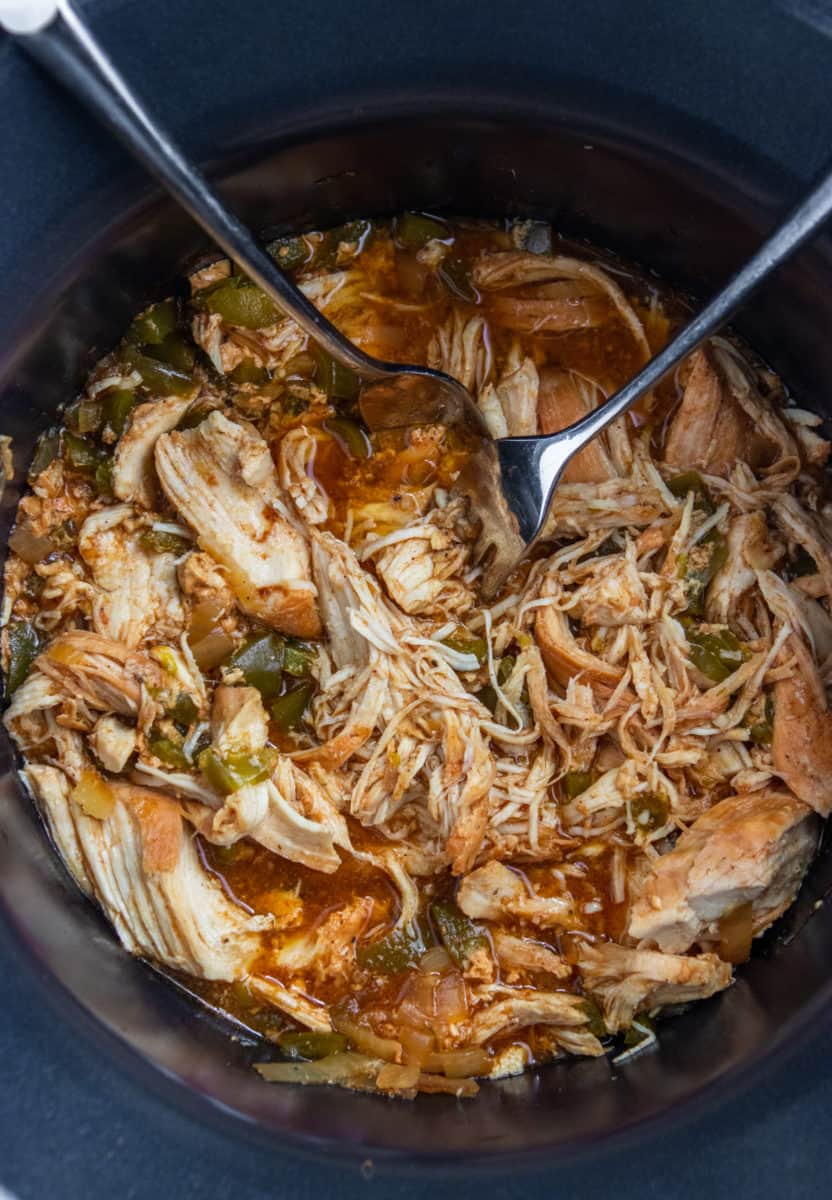 Shredded chicken in slow cooker.