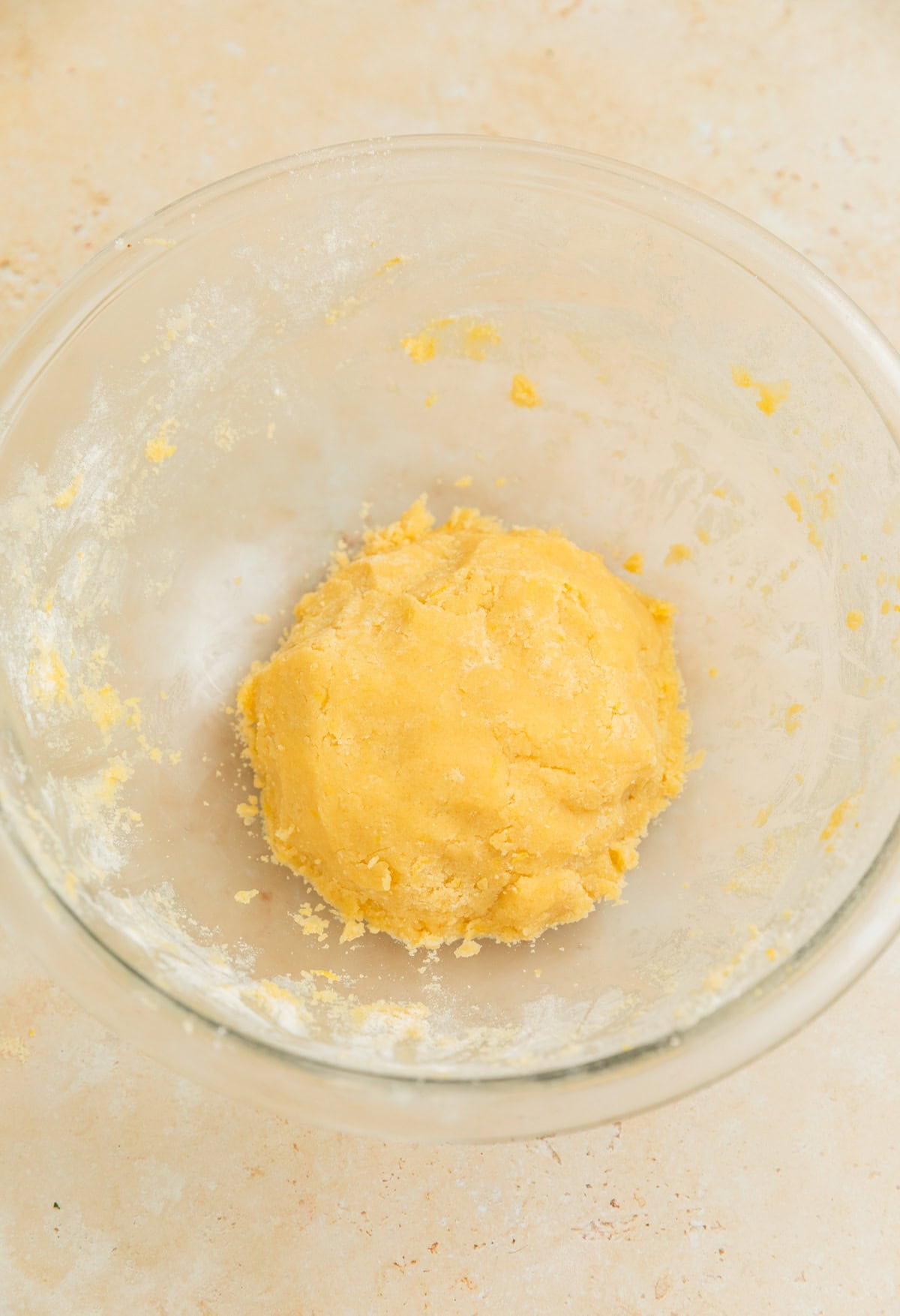 Prepared lemon sugar cookie dough in bowl.