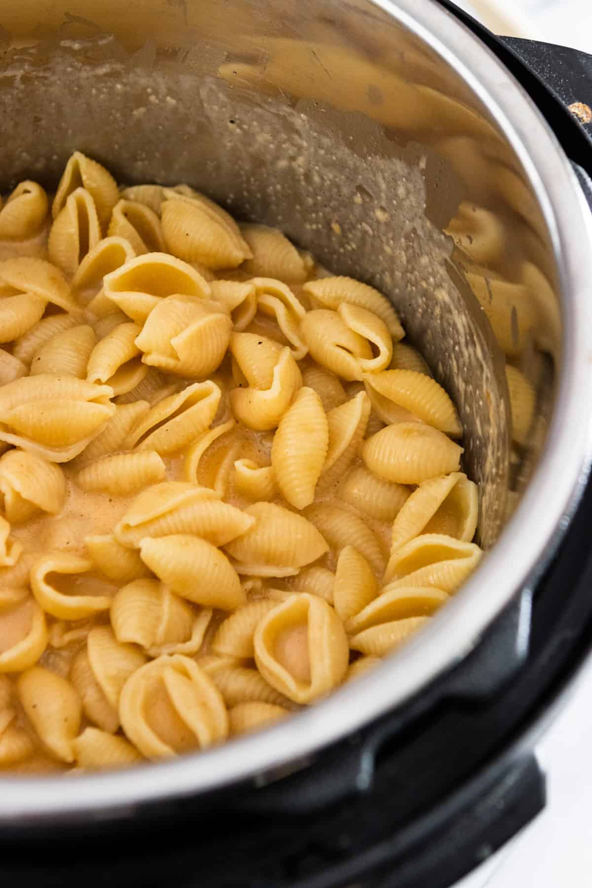Macaroni and cheese in pressure cooker pot.