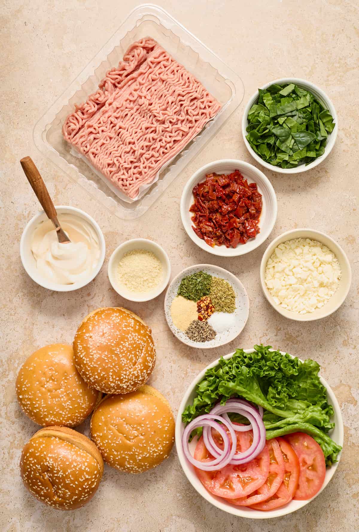 Ground turkey, spinach, seasoning, feta, and other ingredients.