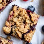 Mixed berry bars on wax paper.