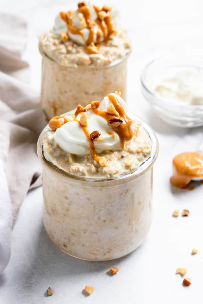 Peanut butter greek yogurt overnight oats with peanut butter drizzle.