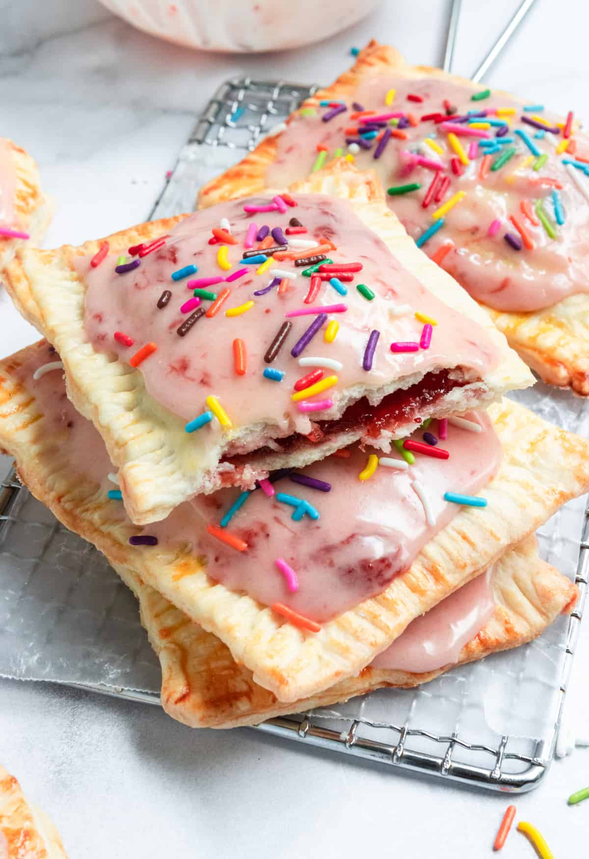 Homemade Pop Tart with strawberry filling and sprinkles.