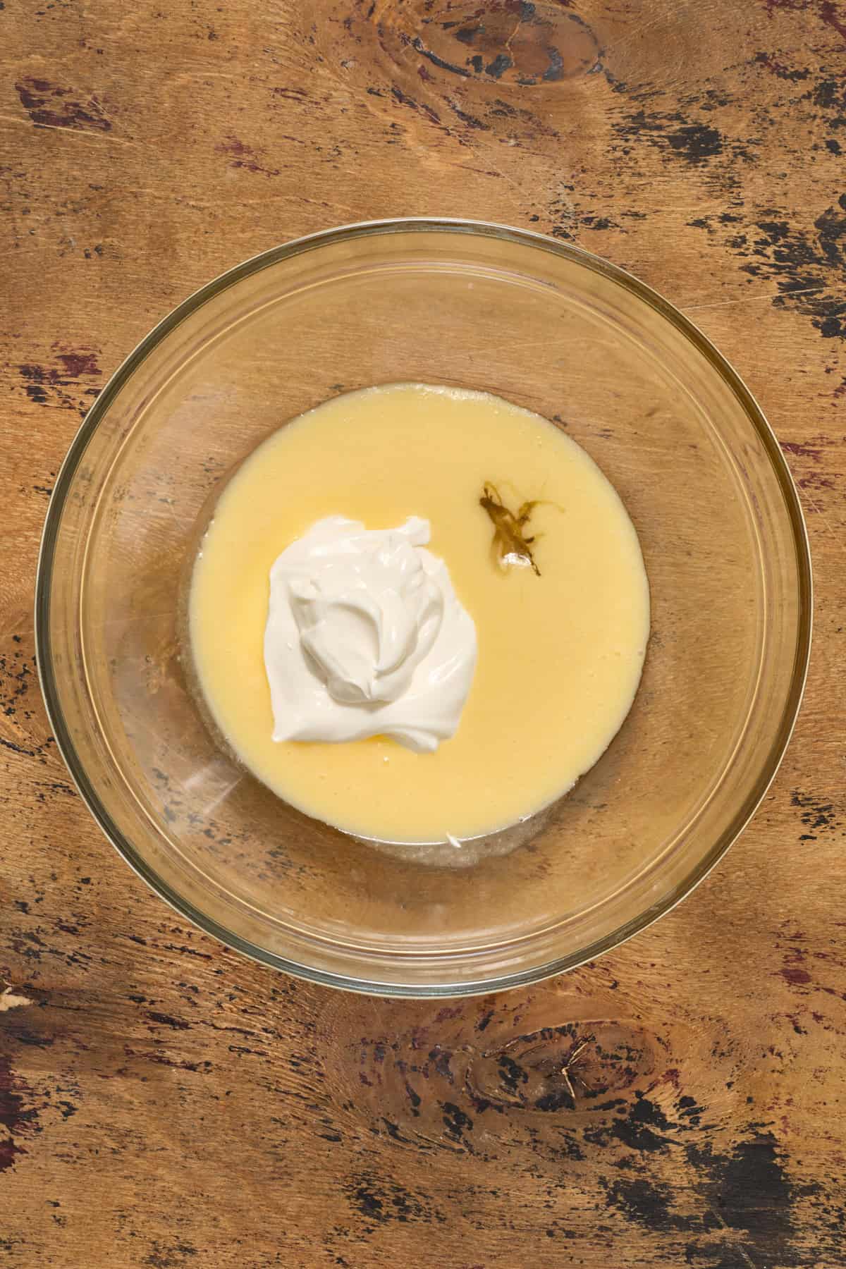 Butter and egg whisked together and then honey and sour cream added.