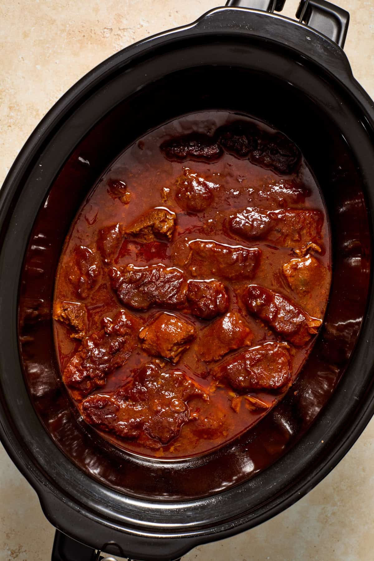 Cooked country style bbq ribs in crockpot.