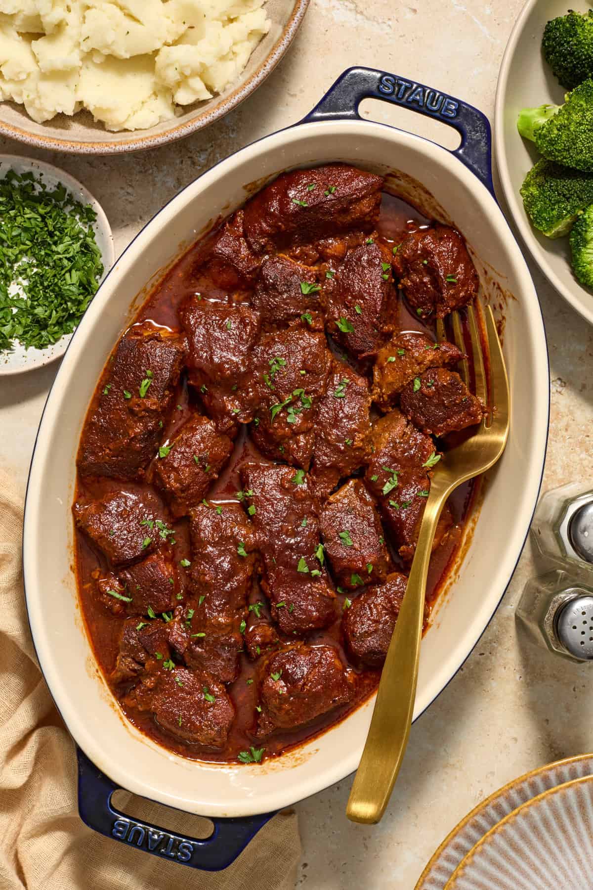 Serving dish with bbq smothered pork boneless ribs.