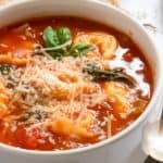 Bowl of soup with parmesan cheese.