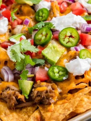 Pulled Pork Nachos on sheet pan.