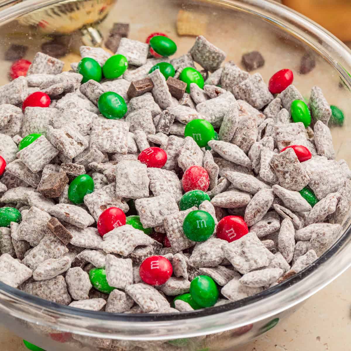 Bowl with holiday mint chocolate puppy chow.