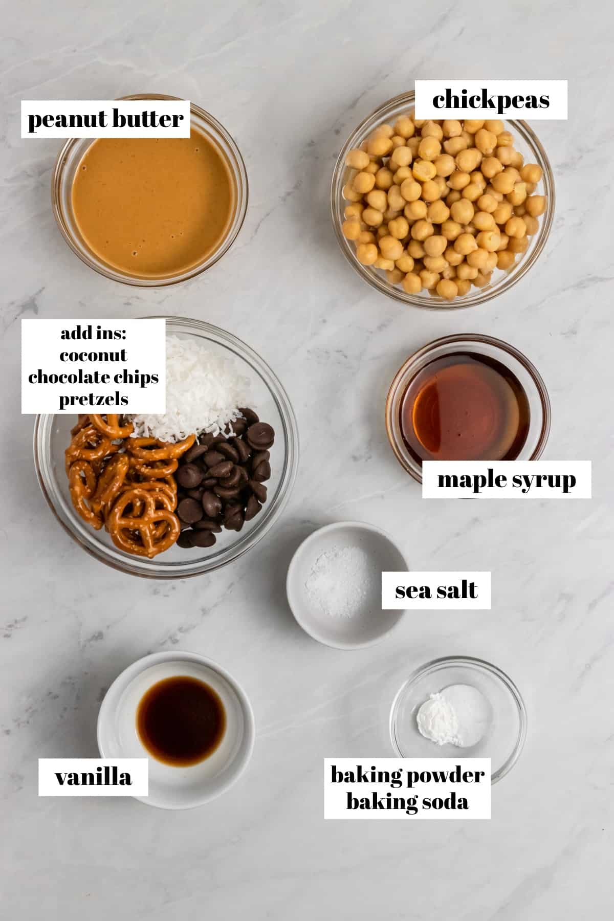 Chickpeas, peanut butter, maple and ingredients labeled on counter.