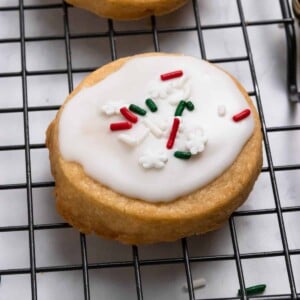 Christmas Shortbread Cookie with icing and red and green sprinkles.