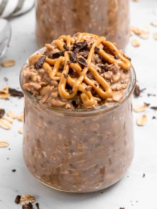 Chocolate peanut butter overnight oats in jar.