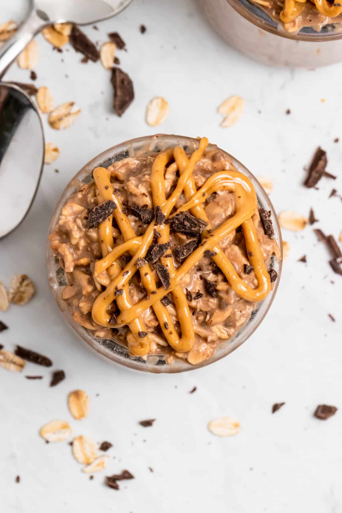Overhead view of oatmeal with peanut butter drizzle.