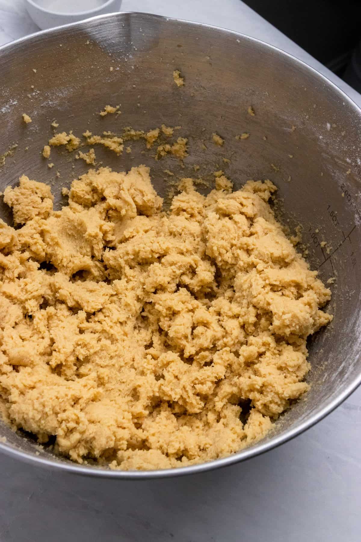 Creamed butter and sugars in mixing bowl.