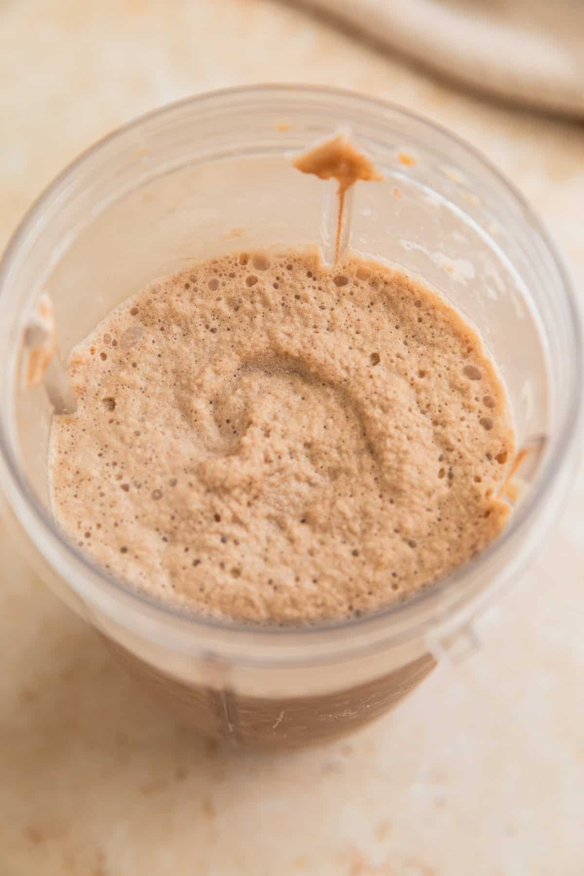 Blended coffee drink in blender cup.