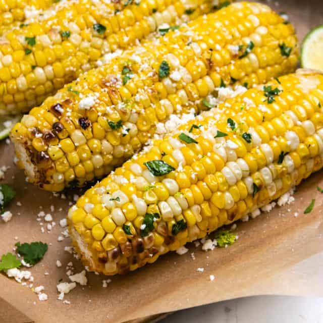 Air Fryer Corn on the Cob with Cilantro Lime Butter Sauce | Lemons + Zest