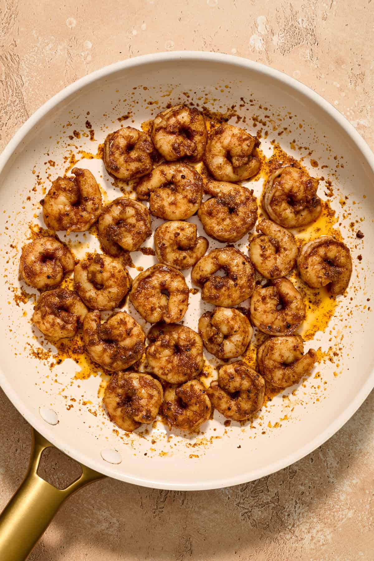 Cooked shrimp in skillet for tacos.