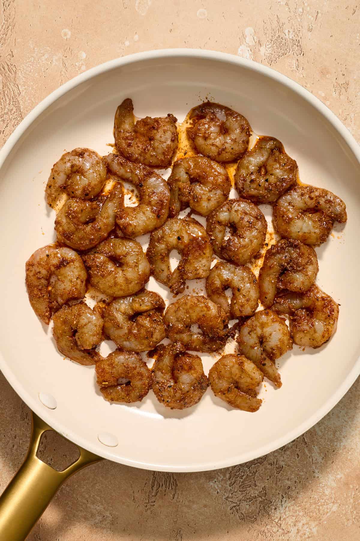 Shrimp in skillet before cooking.