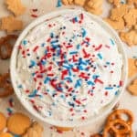 Overhead view of funfetti dip with red, white and blue sprinkles on top.